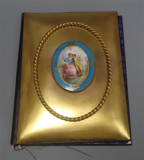A Sevres style gilt metal mounted blotter with oval porcelain plaque 28cm